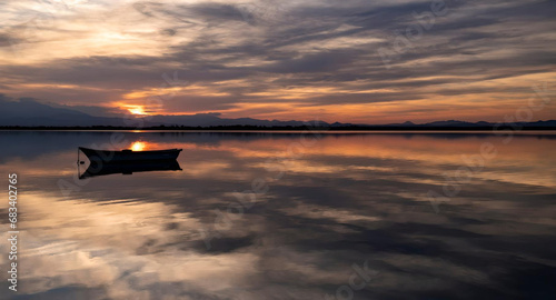 Reflets du coucher de soleil sur l'étang © Catherine