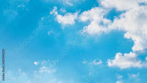 Blue sky with white fluffy cloud. Cumulus clouds background. Cloudscape morning sky. The concepts of freedom of live, never give up and positive though energy. 