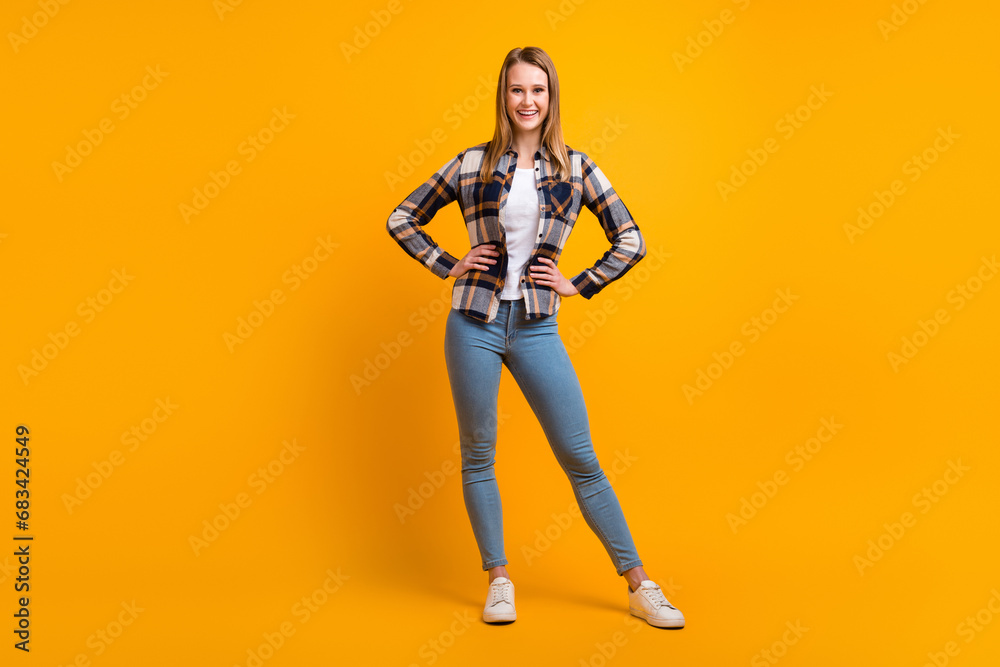 Full length photo of young business lady self confident person professional isolated yellow color background Full length photo of young business lady self confident person professional isolated yellow color background