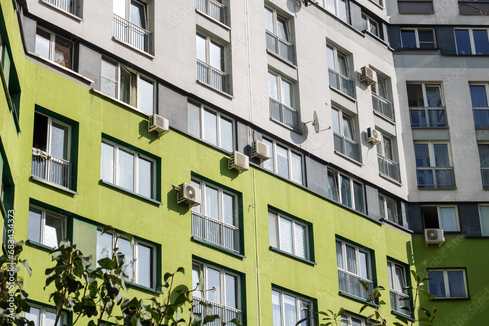 Air conditioners on wall of tall building