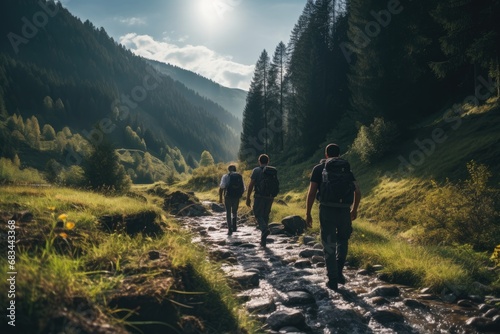 People are hiking in the mountains in groups.