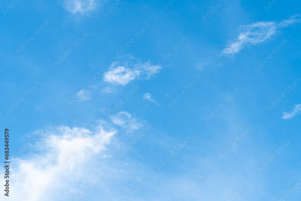 Beautiful blue sky with strange shape of clouds in the morning or evening used as natural background texture in decorative art work. Beautiful blue sky with strange shape of clouds in the morning or evening used as natural background texture in decorative art work.