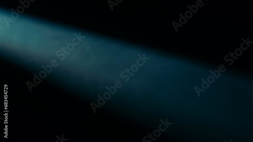 Abstract atmospheric smoke in blue neon light. Colorful smoke on black background, suitable for advertising hookah, vape, car smoke, photo shoot or creating other atmosphere.