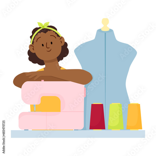 Dark-skinned woman seamstress sitting with a sewing machine