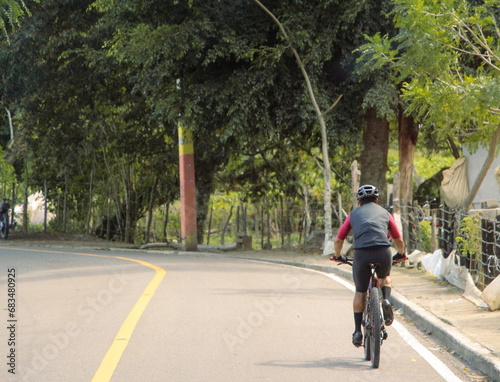 Wallpaper Mural Cyclist riding bicycle on the road, Dominican Republic Torontodigital.ca