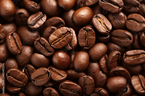 Close-up of roasted coffee beans on a backdrop. photo