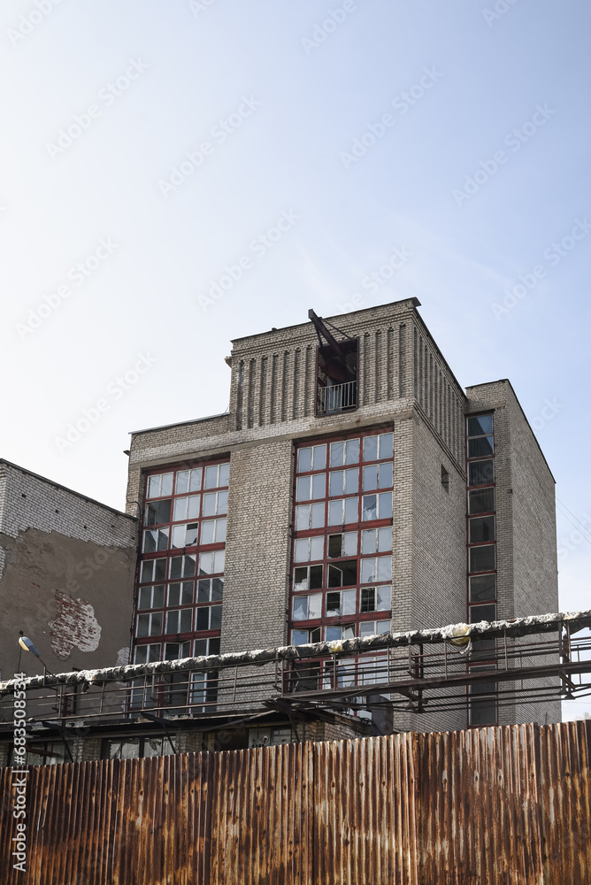 Old abandoned factory and warehouse premises of an industrial enterprise.