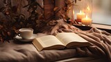 Cozy reading setup with tea and book