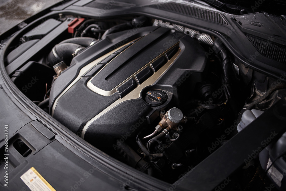 Car engine with opened hood. Car service background