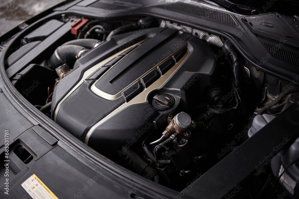 Car engine with opened hood. Car service background Car engine with opened hood. Car service background