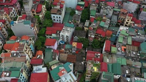 Aerial, vietnam and buildings with crowded population, growth and cityscape for architecture development. Drone, village and nature with property infrastructure, houses and sustainability problem