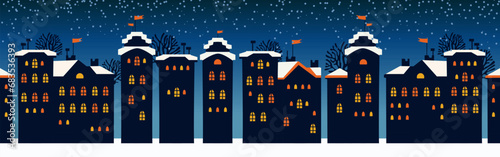 Cute Christmas and winter Night city houses. Snowy Windows of the lights town panorama.