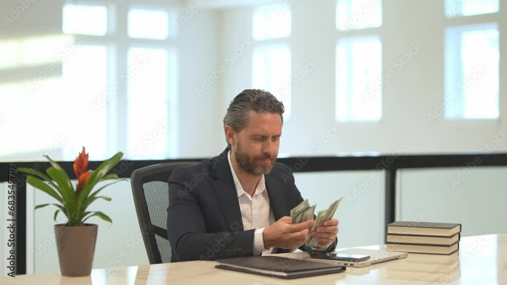 Earn money. Business man counting dollars in office. Businessman in suit dollars. Businessman hold dollars money banknotes. Businessman in suit count dollars. Businessman give money. Earn money. Business man counting dollars in office. Businessman in suit dollars. Businessman hold dollars money banknotes. Businessman in suit count dollars. Businessman give money.