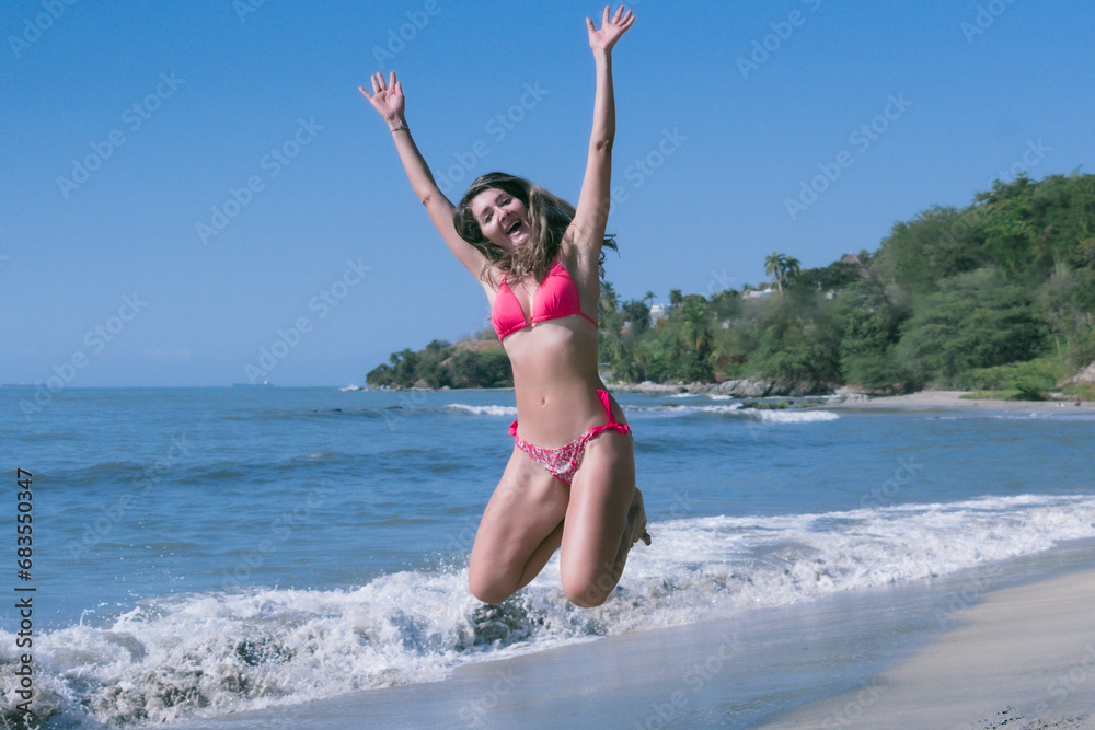With a radiant aura, the bikini-clad woman runs towards freedom on the warm Caribbean beach, her sexy and bronzed figure reflecting the exuberance of tropical life, encapsulating the bliss of unforget With a radiant aura, the bikini-clad woman runs towards freedom on the warm Caribbean beach, her sexy and bronzed figure reflecting the exuberance of tropical life, encapsulating the bliss of unforget