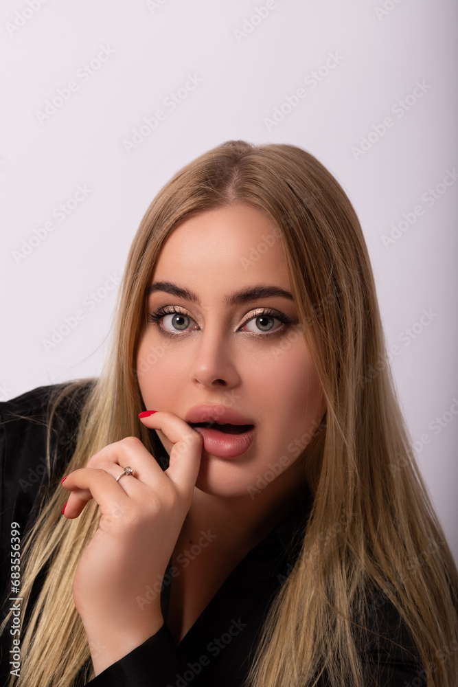 The face of a beautiful young blonde woman. Emotional portrait The face of a beautiful young blonde woman. Emotional portrait