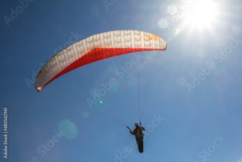 beauty of Paragliding flying, freeflying and powered paragliding in scenic nature aerial landscapes,adrenaling outdoor sport,Having fun and traveling with paragliding wing