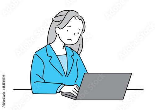 ラップトップで仕事するスーツの女性、困っている