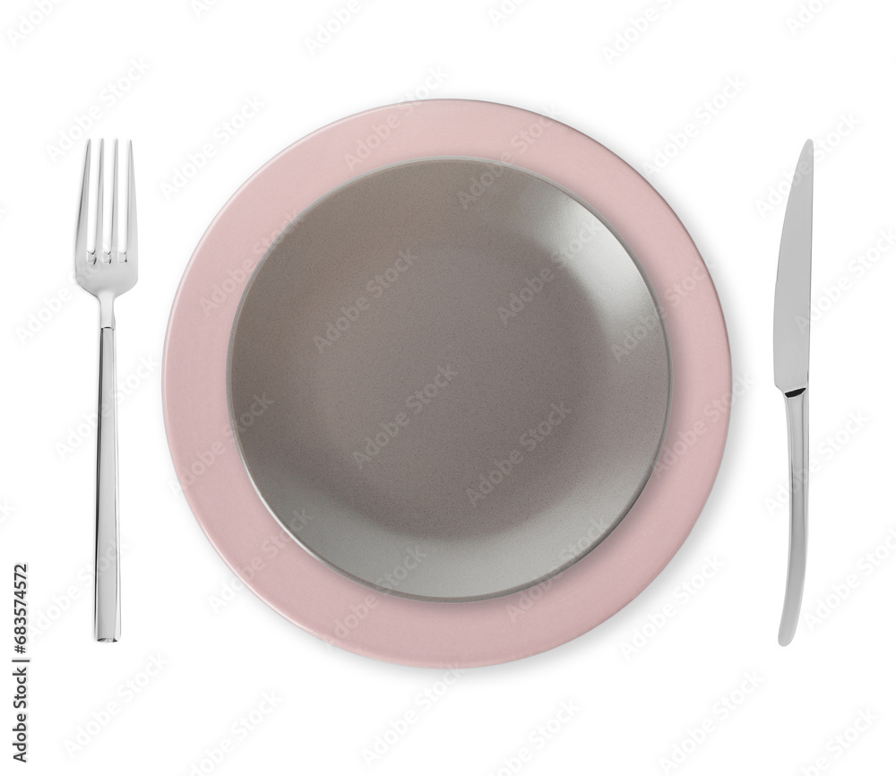 Clean plates, fork and knife on white background, top view Clean plates, fork and knife on white background, top view