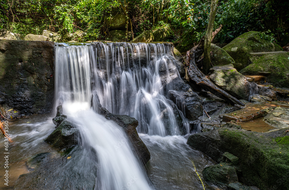 Stream and waterfall in a tropical jungle on Koh Samui island in Thailand Stream and waterfall in a tropical jungle on Koh Samui island in Thailand