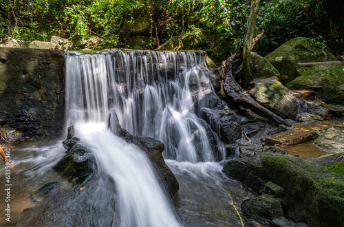 Stream and waterfall in a tropical jungle on Koh Samui island in Thailand
