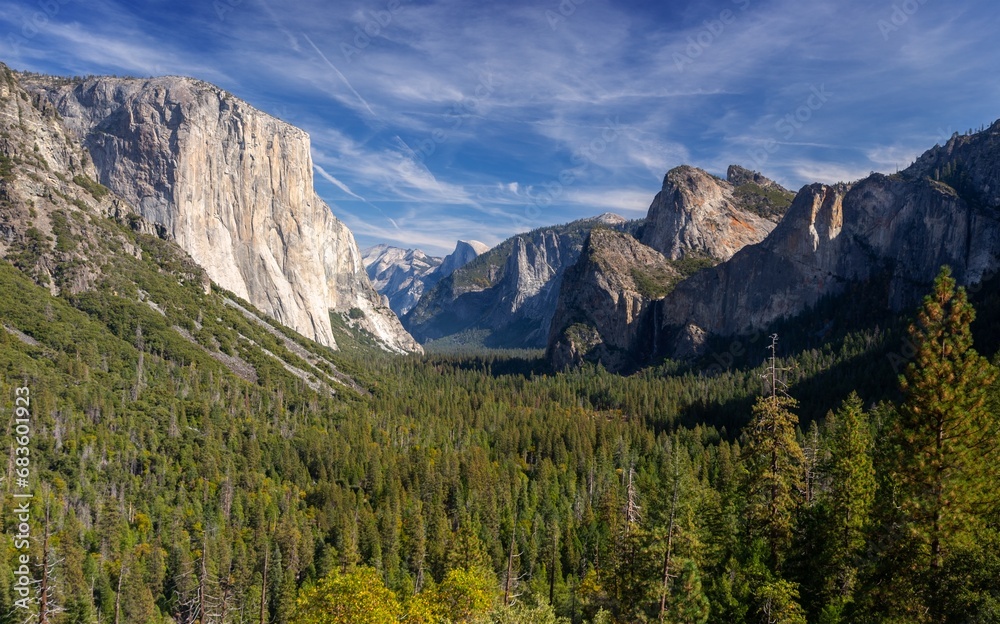 Yosemite National Park Panorama, Scenic Tunnel View Roadside Viewpoint.  Famous Half Dome and El Capitan Granite Mountain Peaks Landscape, Sierra Nevada Forest Valley