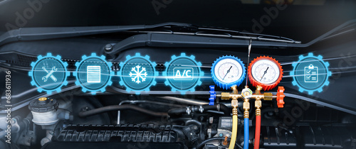 Measuring manifold gauge with car care maintenance and service icons check refrigerant and filling car air conditioner to fix repairing heat conditioning system. photo