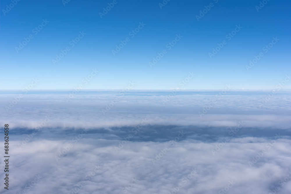 Passenger plane sailing on the sea of clouds