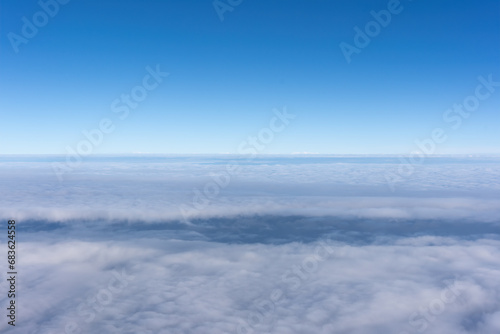 Passenger plane sailing on the sea of clouds © 昊 周