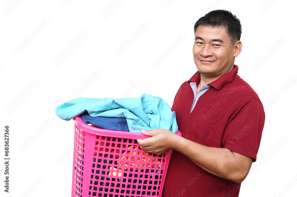 Asian man holds laundry basket full of clothes for washing, isolated on white background. concept, daily chores, household. Real life duty routine, washing cloth for hygine. Asian man holds laundry basket full of clothes for washing, isolated on white background. concept, daily chores, household. Real life duty routine, washing cloth for hygine.