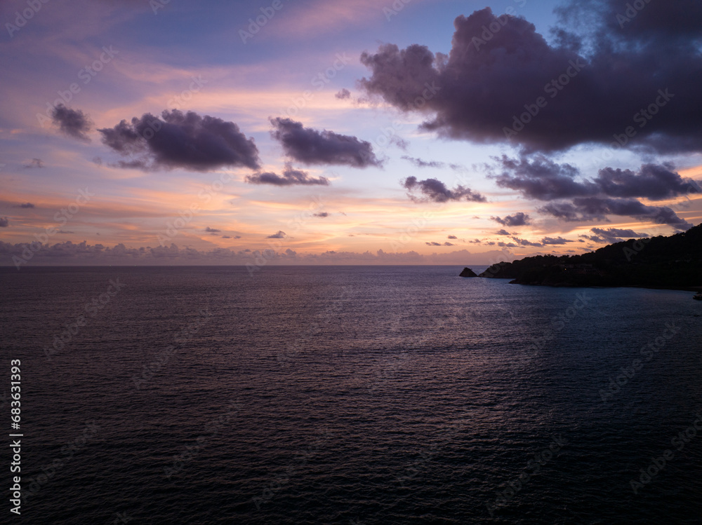 Amazing sunset or sunrise sky over sea landscape,Beautiful colorful light of nature seascape background,Drone aerial view ocean background