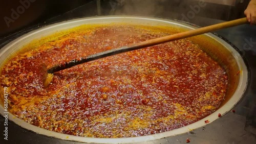 Boiling hot pot seasoning in a large pot