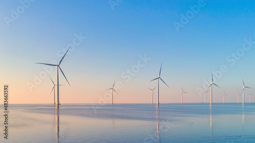 Windmill turbines Park at sunset, windmill turbines at sea
