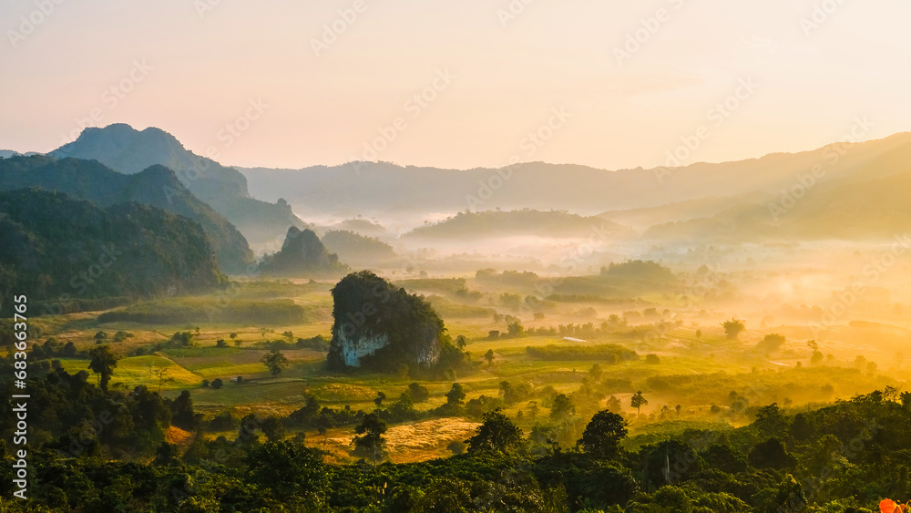 Obraz premium Phu Langka during sunrise Northern Thailand in the mountains, Morning landscape view of Phu Langka mountain forest park in Phayao province Thailand. Asia with mist and fog at sunrise