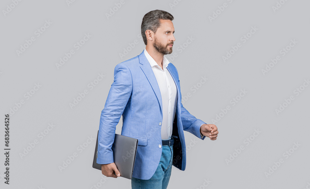 Successful businessman isolated on grey. Professional occupation of businessman hold laptop. Business boss portrait of man. Successful business. On the way to success. Office manager