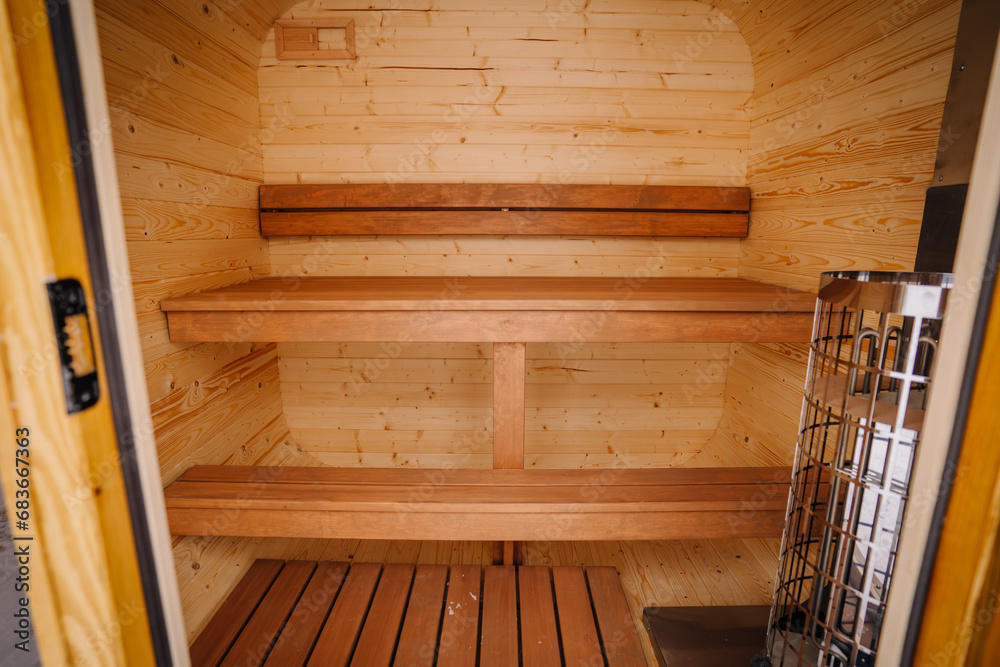 Small home wooden sauna, spa room. Relax in a hot sauna. Small home wooden sauna, spa room. Relax in a hot sauna.