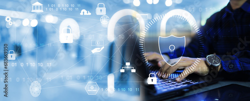 Cyber security and network data information protection concept with businessman using laptop computer on working desktop office on cloud computing and cyber space technology