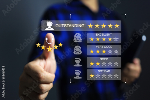 Customer feedback concept with thumb up five stars outstanding indicate most satisfaction with quality and service experience at store by give highest rating response to online questionnaire survey