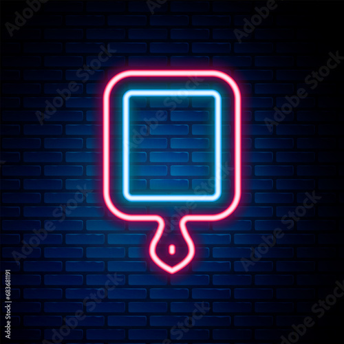 Glowing neon line Cutting board icon isolated on brick wall background. Chopping Board symbol. Colorful outline concept. Vector