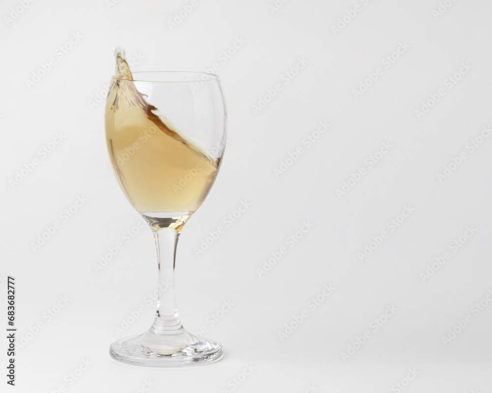 front view of white wine glass isolated on white background