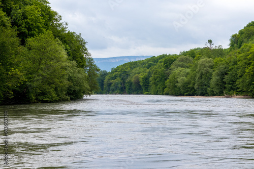river, mountainous terrain, cloudy day, the beginning of the summer period, walking in the bosom of nature, panorama of the area. © NAIL BATTALOV