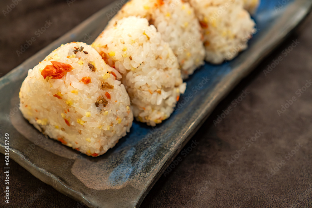 Japanese Rice Balls Onigiri with Salmon Flakes and Mixed Grains Japanese Rice Balls Onigiri with Salmon Flakes and Mixed Grains