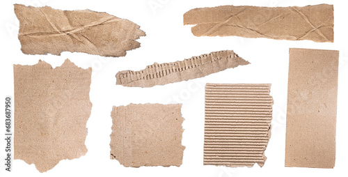 Set of torn brown cardboard pieces isolated on transparent background photo