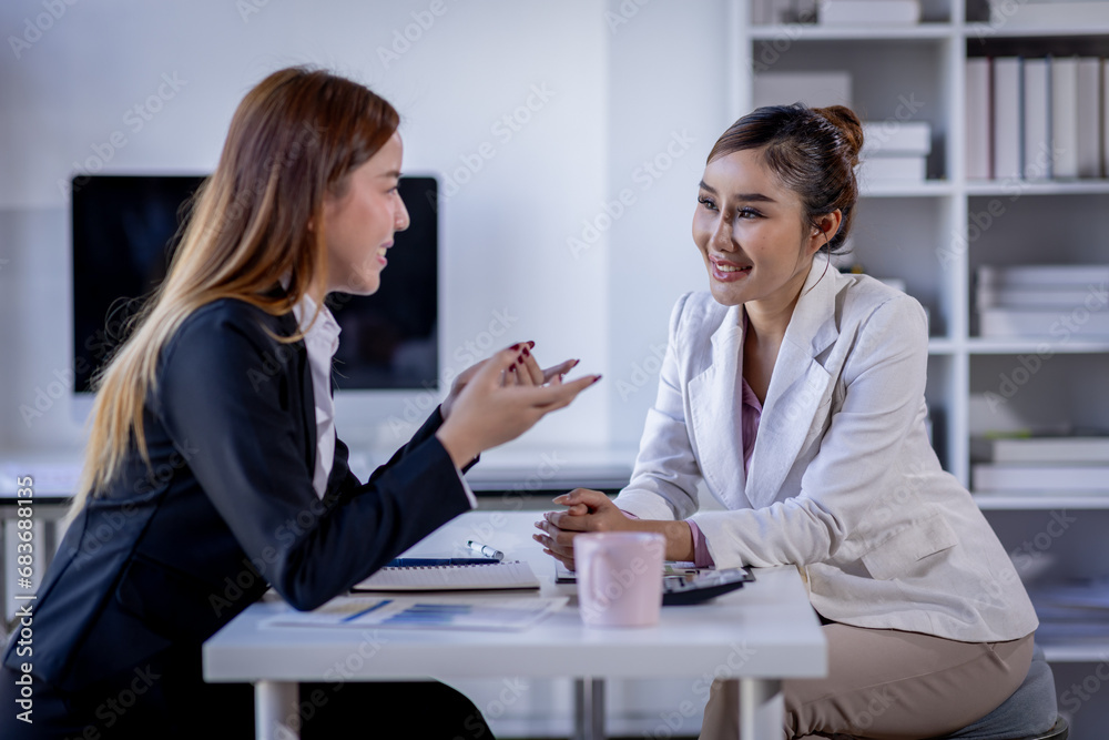 Fototapeta premium Financial Business team analyze the graph of the company's performance to create profits and growth, Market research reports and income statistics, Financial and Accounting concept. 
