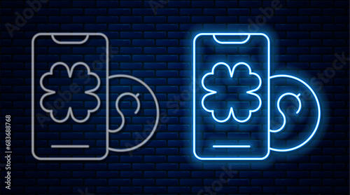 Glowing neon line Online poker table game icon isolated on brick wall background. Online casino. Vector