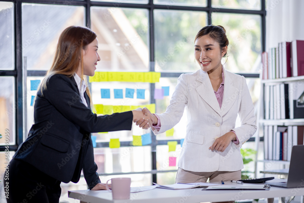 Fototapeta premium Business woman offer and give hand for handshake in office. Successful job interview. Apply for loan in bank. Salesman, bank worker or lawyer shake for deal, agreement or sale. Increase of salary.