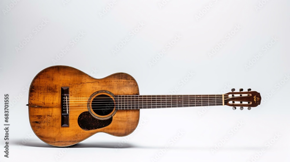 a brown acoustic guitar - obrazy, fototapety, plakaty 