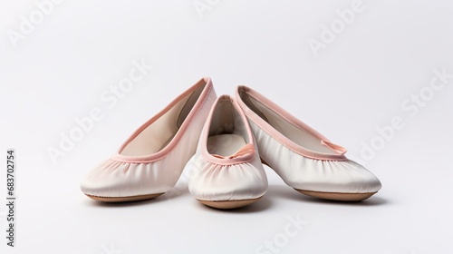 a pair of pink and white shoes