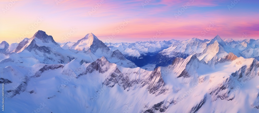 Beautiful landscape of mountains with white snow and blue sky. AI generated image