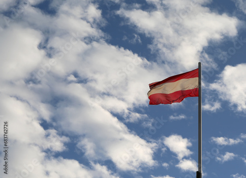 National Flag of Austria flying in the Air in Wien, Austria
