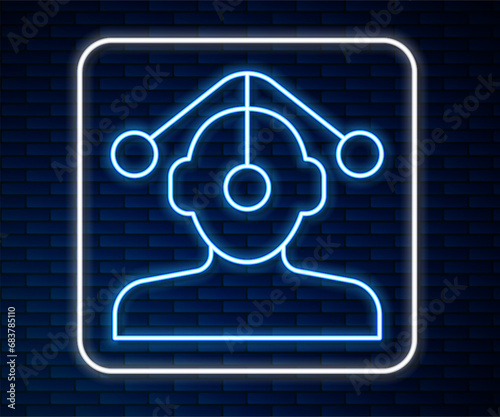 Glowing neon line Hypnosis icon isolated on brick wall background. Vector